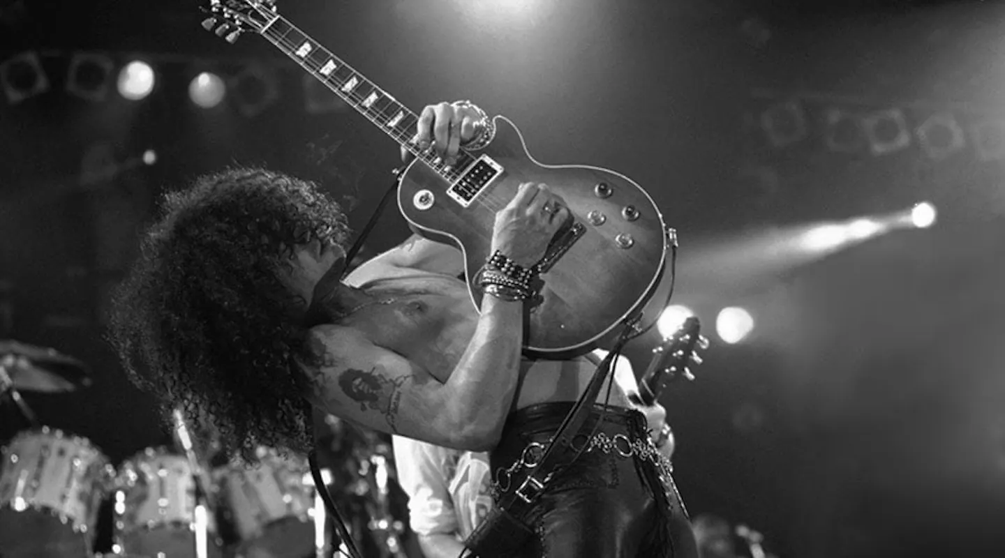 Photo of Slash [Credit: Mick Hutson/Redferns (April 20, 1992)]