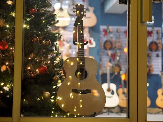 Castle Rock Music: Store window with accoustic guitar