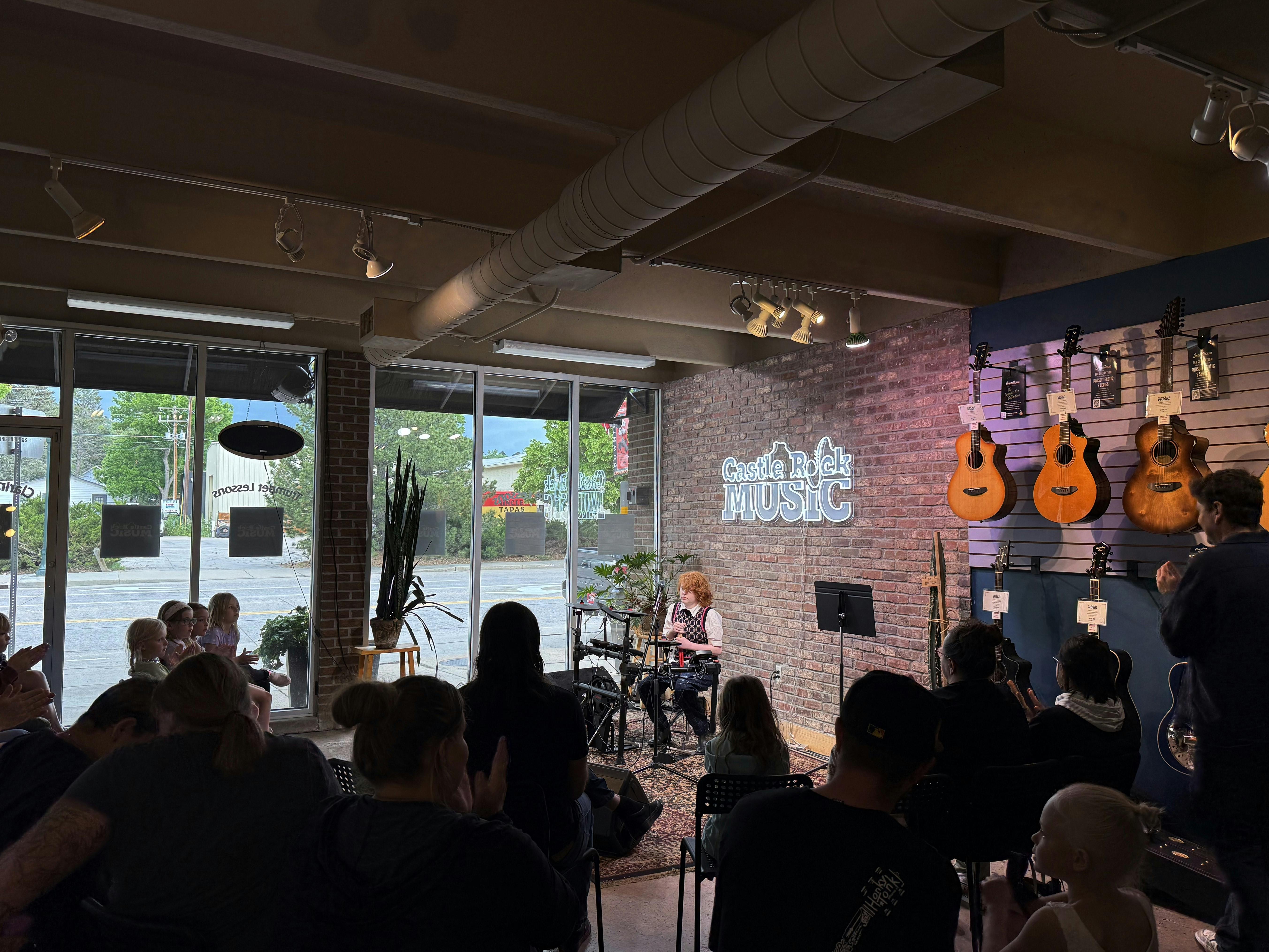 Performance: Student drummer and audience